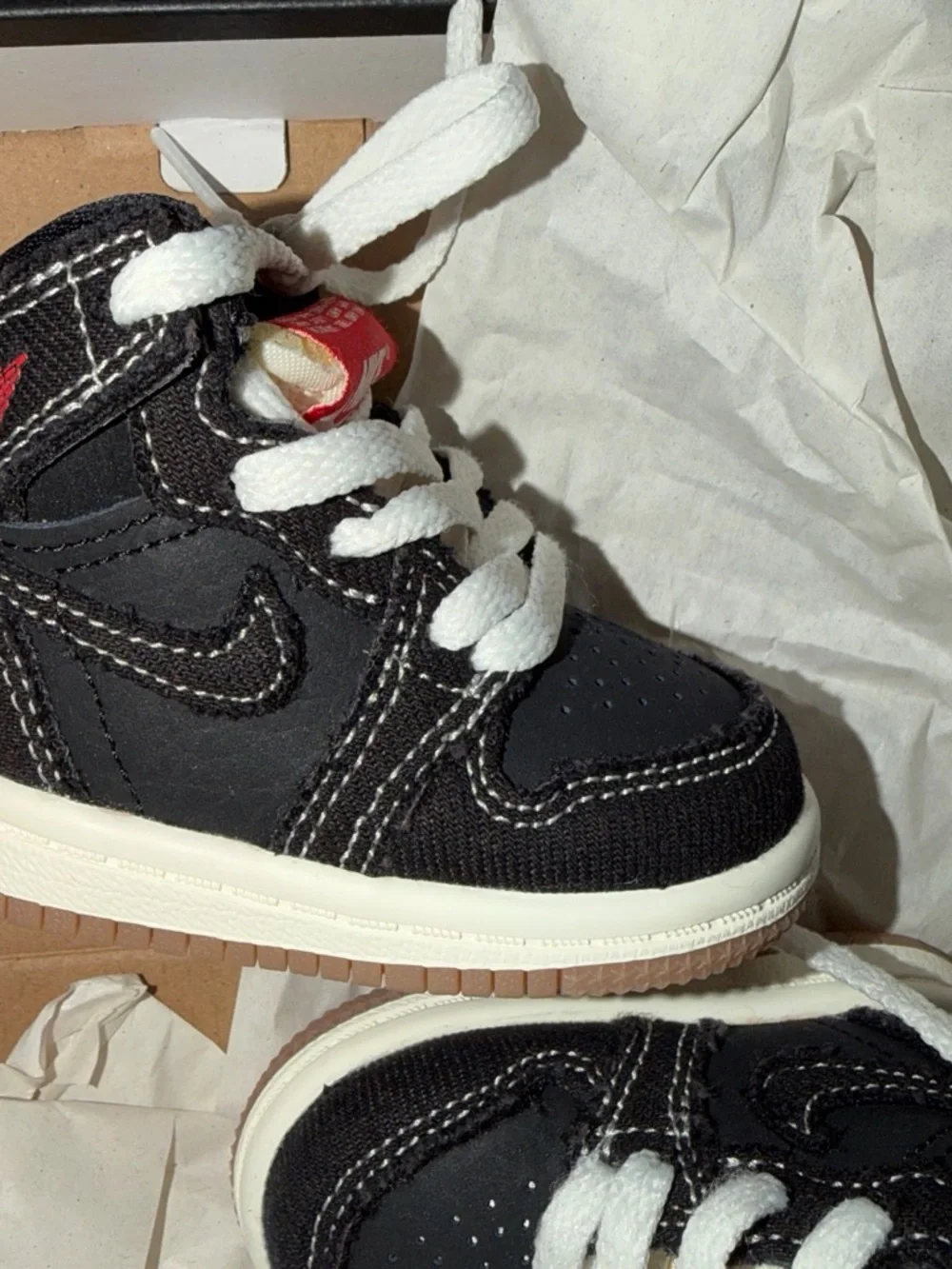 Nike Kids Black and White High-Top Sneakers with Red Accent